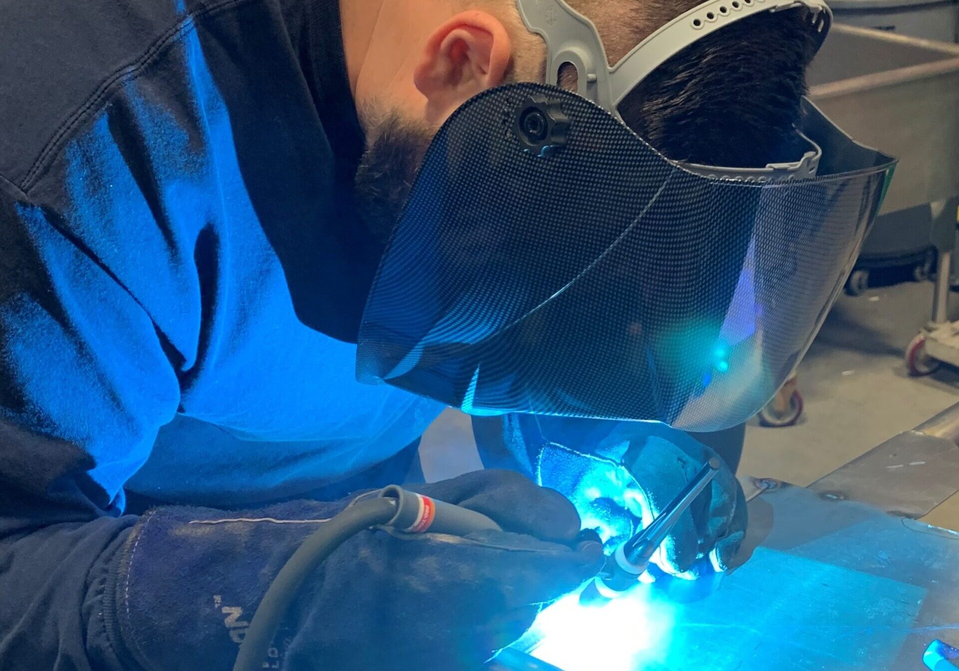 A certified Maintenance Repair Service technician welds a metal sheet for a custom fabrication. A certified Maintenance Repair Service mechanic repairs a broken Henny Penny combination oven for a local commercial Toronto/Ottawa retail outlet grocery store. 